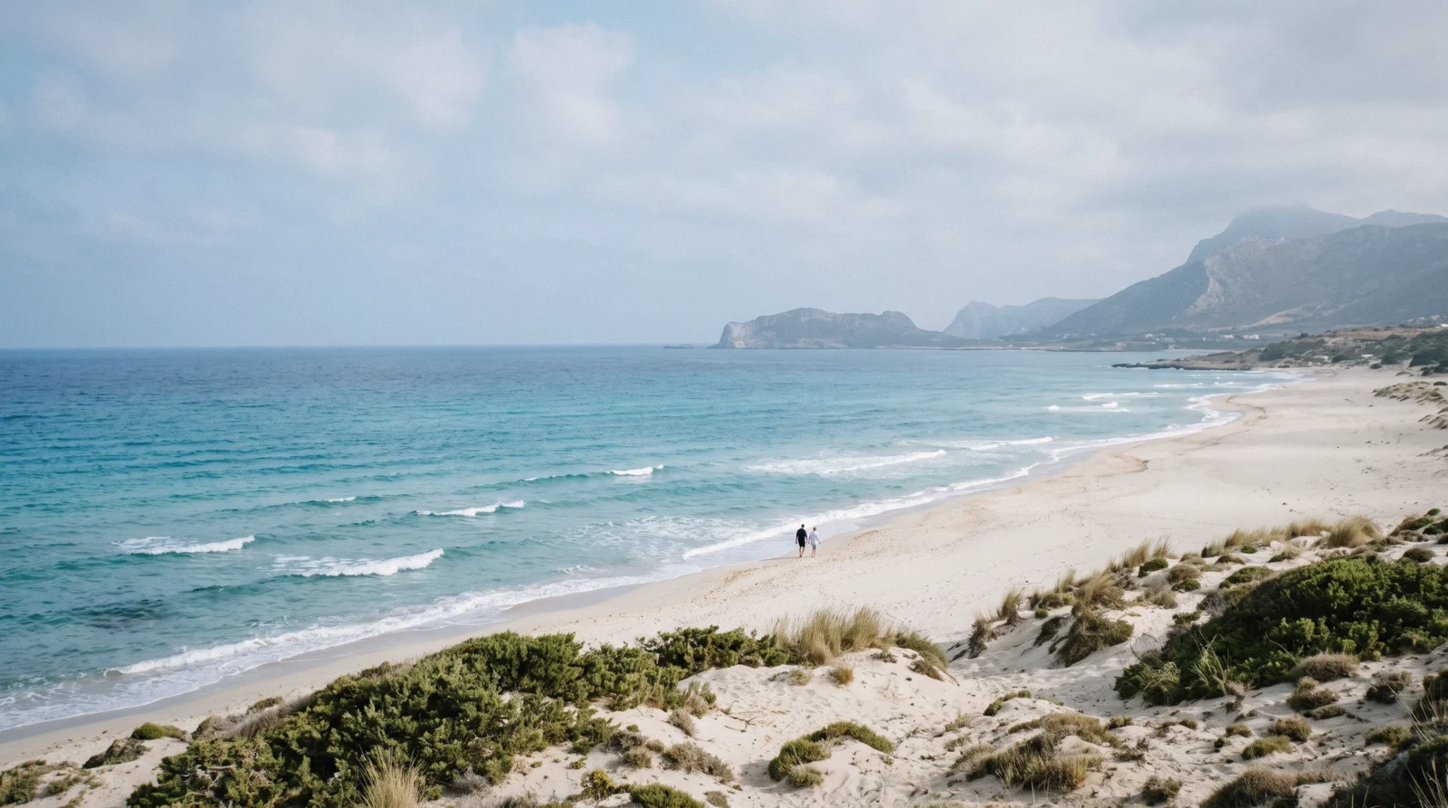 Wide golden sand and turquoise water at Falassarna beach on Crete's west coast