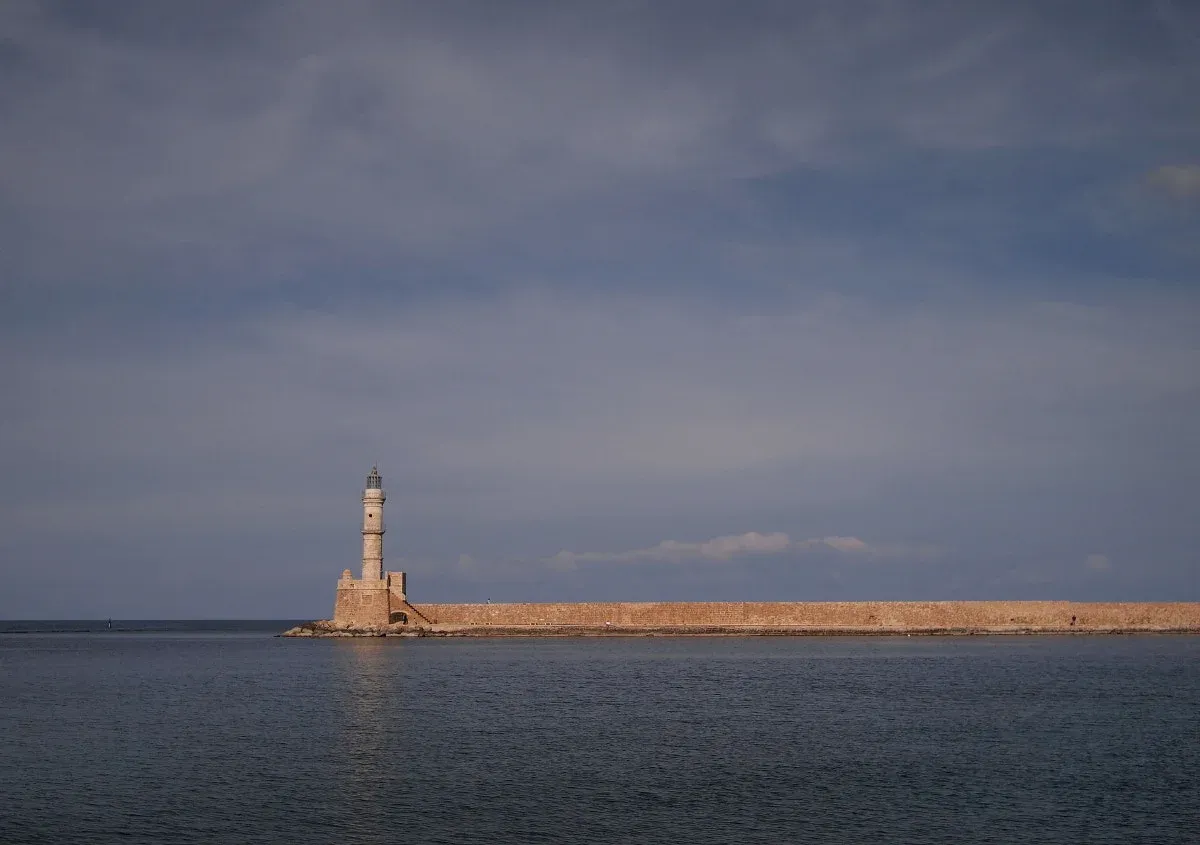 The Venetian lighthouse of Chania at the end of the harbour breakwater, one of the two bases in the chania or heraklion decision