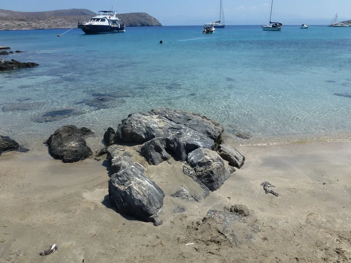 Excursion boats anchored off a beach on Dia island near Heraklion, Crete