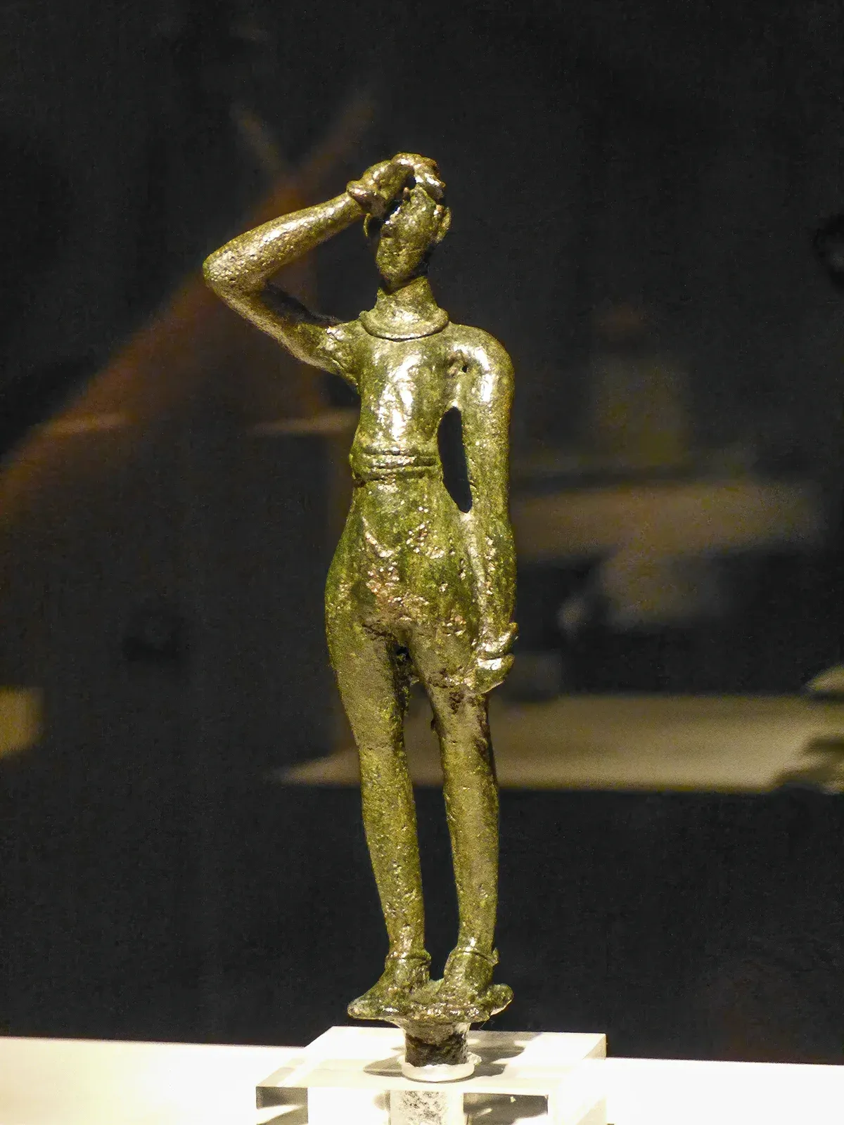 Bronze Minoan votive figurine performing a salute gesture, from Tylissos, at the Heraklion Archaeological Museum