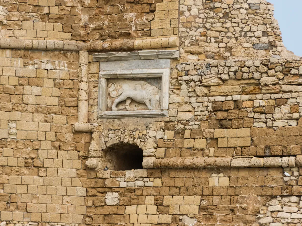 The winged lion of St Mark carved into the Venetian wall of Koules Fortress, Heraklion, Crete